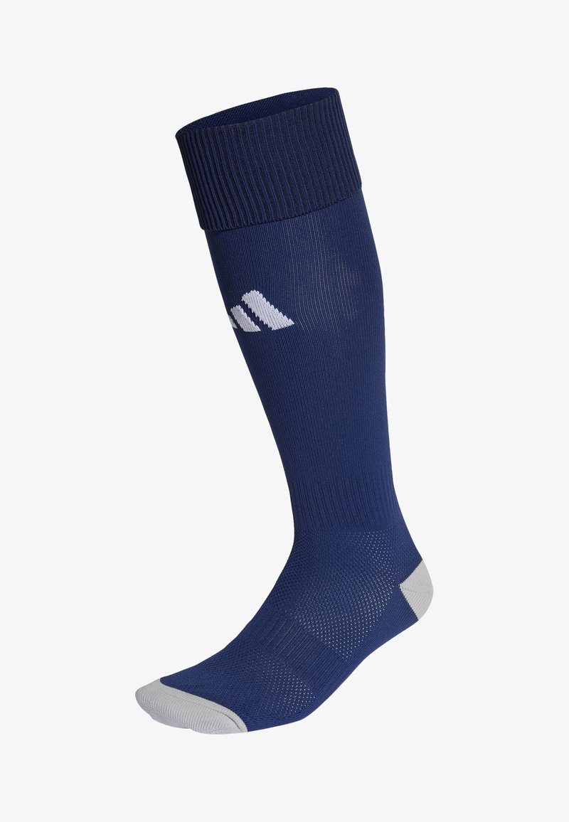 Calcetín azul marino de longitud hasta la rodilla con puño acanalado, textura de malla, secciones de los dedos y talones acolchadas en gris, y acento de logo blanco en el lateral.