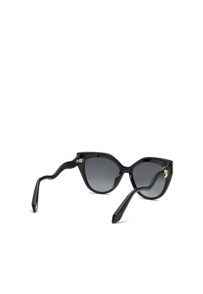 Lunettes de soleil œil-de-chat noires avec verres dégradés foncés et branches texturées avec détails serpent et petits accents dorés.
