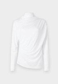Long-sleeved white top with a mock neck, featuring draped fabric, soft texture, and an asymmetrical front design. Smooth finish.