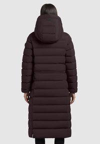 Long, puffer coat in deep burgundy with horizontal quilted design, featuring a large hood and long sleeves. Material appears smooth and insulated.