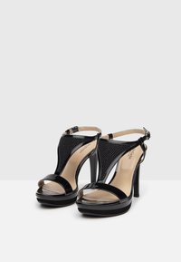 NeroGiardini Korolliset sandaalit - black