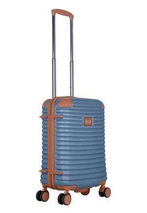 Blue hard-shell suitcase with brown accents, telescopic handle, four double spinner wheels, and "ELLE" logo plate in the center.