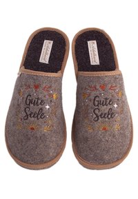Grey felt slippers with brown accents, featuring embroidered text "Gute Seele" surrounded by decorative designs, soft texture, and slip-on style.