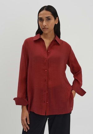 someday. REGULAR FIT CUT OUT - Button-down blouse - ruby red