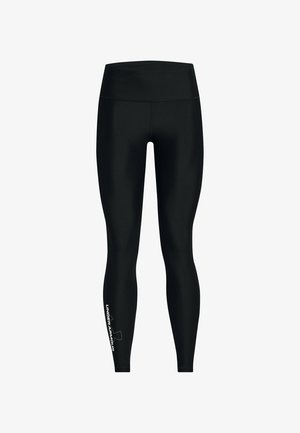 Sorte leggings lavet af strækbart materiale, med en høj talje og et hvidt logo på den nederste venstre ben. Glat tekstur, tætsiddende design.