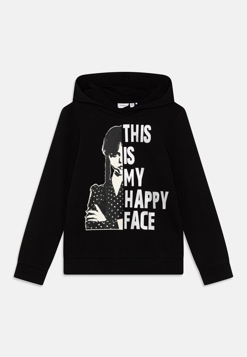 Sweat à capuche noir avec un graphique blanc d'une fille qui croise les bras et le texte « C'EST MON VISAGE HEUREUX » en lettres grasses.