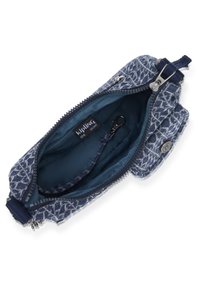 Blue patterned Kipling pouch with a zip closure. Interior features a solid blue lining and a clip for extra security. Compact and lightweight design.