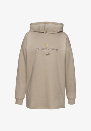 Beige hoodie made of soft fabric, featuring a large front print reading "YOU MAKE MY HEART smile" with a small gold heart accent.