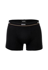 Boxers noirs avec une texture lisse, taille élastique portant le logo "BOSS" en lettres blanches et dorées. Design à taille moyenne.
