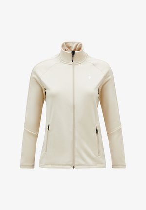 Beige Jacke mit Reißverschluss und hohem Kragen, glattes Material, zwei Seitentaschen und ein kleines Logo auf der linken Brust. Mit taillierten Ärmeln und Nähten.