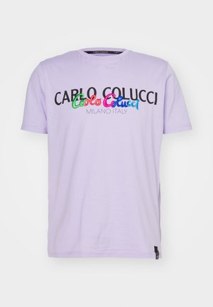 Lavender short-sleeve T-shirt with "CARLO COLUCCI" black text and colorful embroidered logo above "MILANO ITALY" on front.