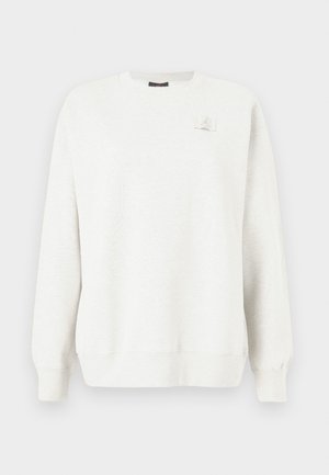 Lysegrå sweatshirt med rund hals, ribbede ærmer og kant. Har et lille logo-patch på brystet. Blødt, tekstureret stof.