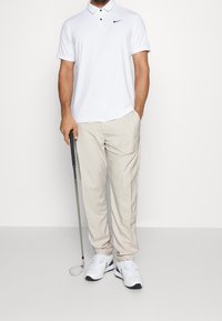 Nike Golf Tygbyxor - off-white