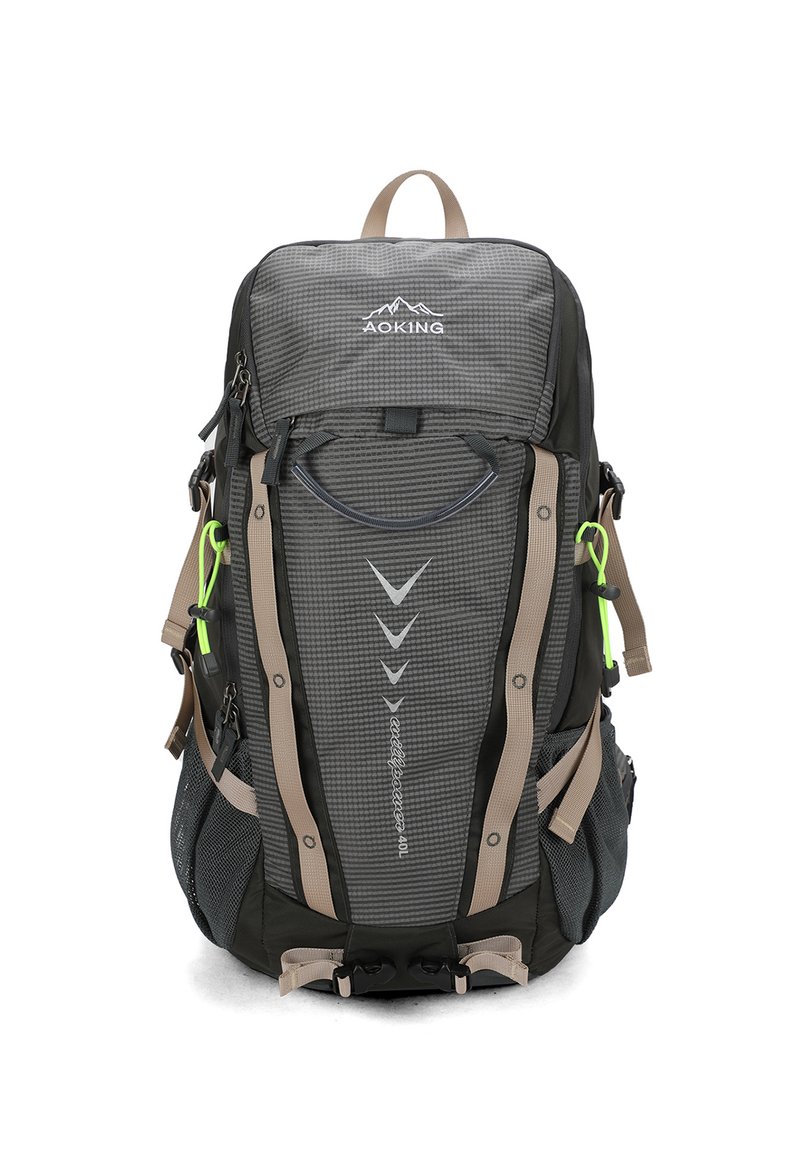 Sac à dos en nylon gris texturé avec des sangles beiges, plusieurs compartiments, poches latérales en mesh et une poignée de transport au dessus.