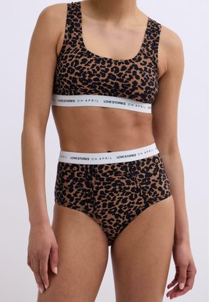 Leopard print bra and high-waisted panties set. Soft fabric with a black waistband featuring "LOVE STORIES O H APRIL" text. Square neckline and wide straps.