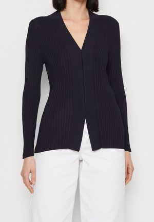 Marineblauwe ribgebreide cardigan met een V-hals, lange mouwen en een rechte snit, met een gladde textuur en zonder zichtbare sluitingen.