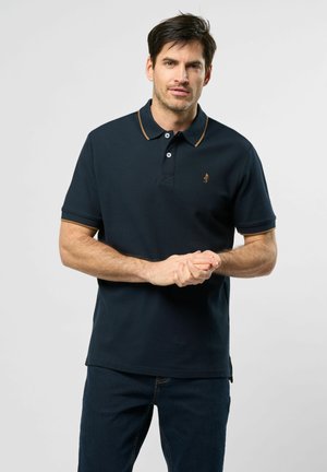 Marineblå polo T-shirt med ribbet krave og brune accenter, med et lille logo på brystet og korte ærmer, lavet af struktureret stof.