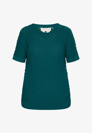 Suéter de manga corta en color verde azulado con un patrón texturizado similar a escamas, cuello y dobladillo acanalados, fabricado en una tela suave. Etiquetado con la marca "usha" en el interior.