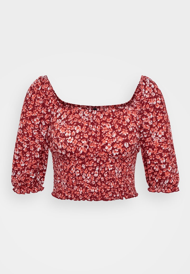 Red strappy top