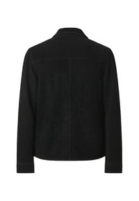 Černá bunda vyrobená z měkké tkaniny, s límcem a dlouhými rukávy. Má čisté linie a dva detaily na zadním švu.