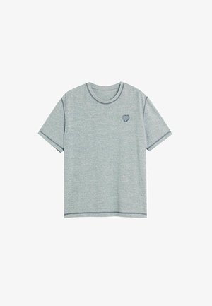 Gray short-sleeve T-shirt made of textured fabric, featuring a round neckline and a small heart emblem on the left chest.
