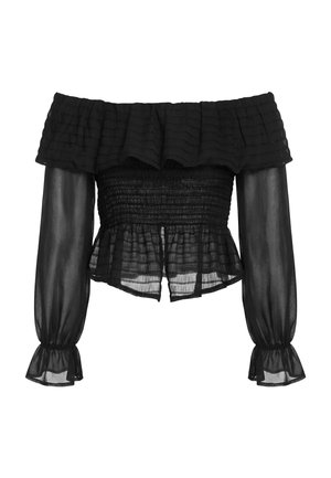 Blusa nera con spalle scoperte, scollatura arricciata, maniche lunghe a sbuffo trasparenti, corpetto arricciato e orlo svasato con una piccola spaccatura frontale.