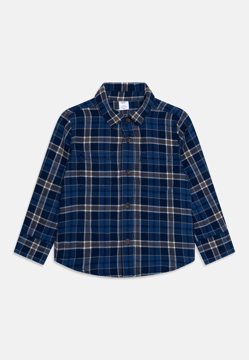 Chemise bleue à manches longues avec un motif à carreaux noir, blanc et gris, deux poches poitrine et un col classique.