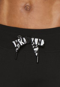DKNY TWO TONE LOGO DRAWCORD JOGGER - Jogginghose - black