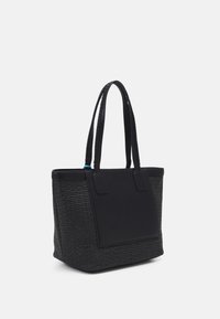 Black tote bag featuring a textured woven body and smooth synthetic accents. Two sturdy handles. Structured shape with a flat base.