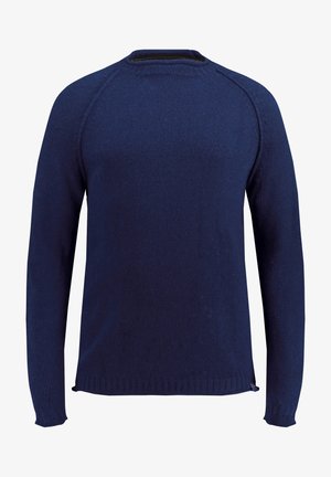 Granatowy sweter dzianinowy z długimi rękawami, okrągłym dekoltem oraz prążkowanymi mankietami i dołem, z małą metką akcentową przy szwie bocznym.