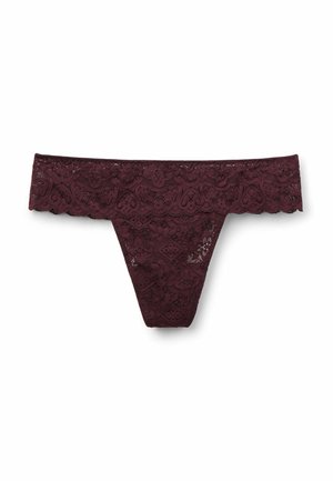 Dark purple lace thong underwear with floral patterns and a scalloped waistband on a white background.