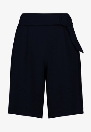 Pantaloncini neri a vita alta con gambe ampie, dotati di una cintura di stoffa con fibbia circolare sul lato destro.