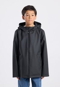 Black waterproof jacket with a hood, front zipper, and side pockets, featuring a smooth texture and minimalist design.