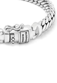Silver chain bracelet featuring a clasp with Buddha design and engraved text. Smooth and textured links create a visual contrast.