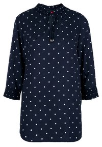 Donkerblauwe blouse met stippen, drie kwart mouwen, smockmanchetten en een tuniekstijl hals met een trekkoord en zilveren hardware.