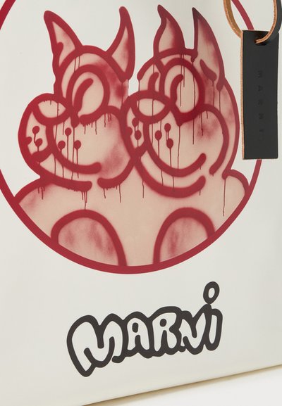 White tote bag features a red graphic of two stylized dog-like figures with dripping effects. Black "MARNI" logo at the bottom.
