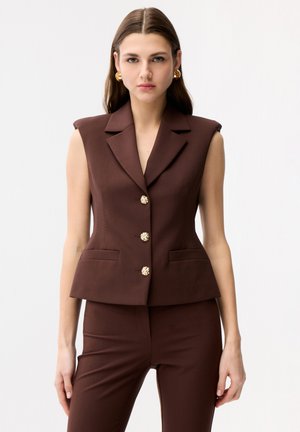 adL Smanicato - brown