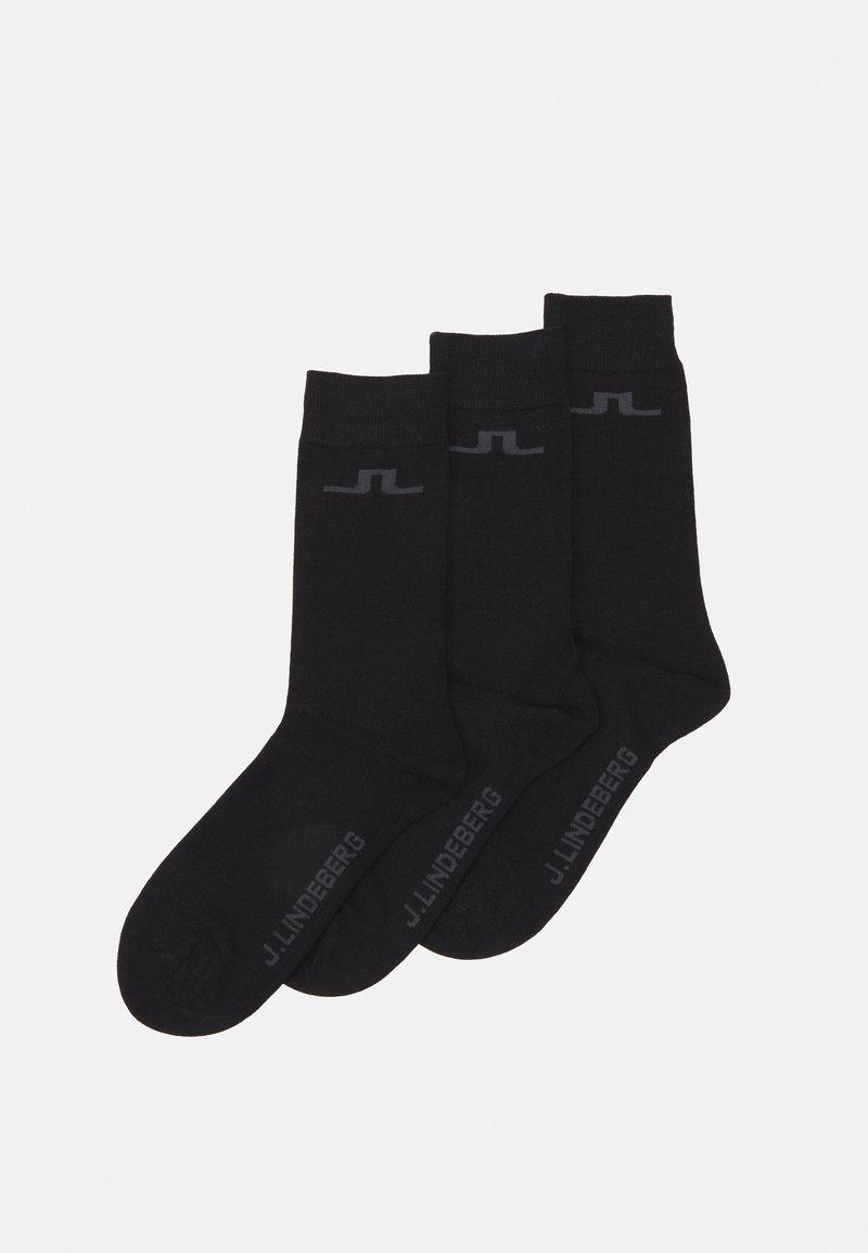 Calcetines de algodón negros de corte crew, con una textura acanalada y el logo "J. Lindeberg" en gris cerca del puño. Un total de tres pares.
