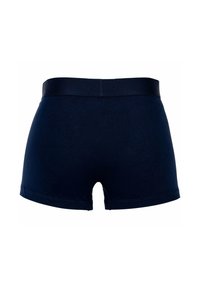 Shorts en coton bleu marine avec une ceinture lisse, présentant un design simple et une coupe mi-longue, se terminant au-dessus de la cuisse.