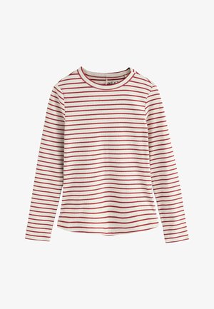 Cămașă cu mânecă lungă în dungi în nuanță crem, cu dungi roșii orizontale. Are un decolteu rotund și un tiv ușor rotunjit pentru o potrivire lejeră.