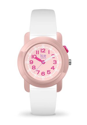 Montre rose en plastique avec un bracelet en caoutchouc blanc. Présente un cadran rose, de grands chiffres roses et une couronne rose avec une aiguille des secondes blanche et rose.