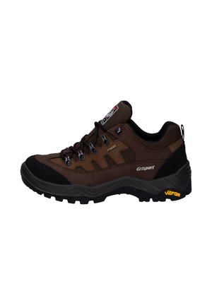 Brown hiking shoe made of leather and synthetic material, with a padded collar, rubber sole, and Vibram branding on the heel.