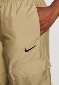 Nike Sportswear Träningsbyxor - olive