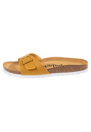 Yellow slide sandal with a wide strap and buckle detail. Cork footbed with a white rubber outsole. Smooth surface and contoured design.