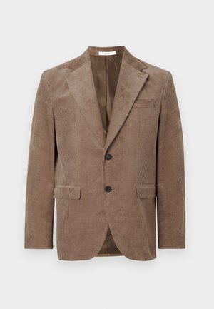 Bruine corduroy blazer met een geprofileerde kraag, twee voorzakken, sluiting met één knop en een gladde binnenvoering. Textuurdetails van de stof zijn zichtbaar.