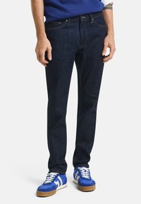Unselected, dark blue worn in