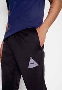 Puma - FUSSBALL PARK PANTS - Jogginghose - black - 5