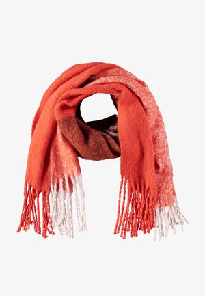 Bufanda suave y gruesa con extremos con flecos, que presenta tonos naranjas, rojos y marrones en un patrón degradado, dispuesta en un lazo sobre un fondo blanco.