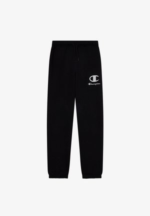 Pantalones de chándal negros con cintura elástica, cordón ajustable y tobillos ajustados, que presentan un logo blanco de Champion en el muslo izquierdo.