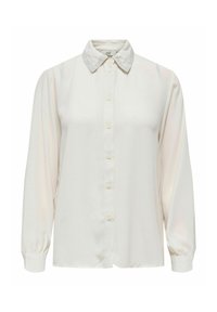 Chemise blanche à manches longues, avec un col, et une texture de tissu douce. Présente un subtil éclat et des poignets arrondis.